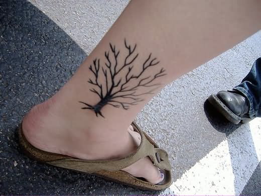 Black Without Leaves Tree Tattoo On Ankle