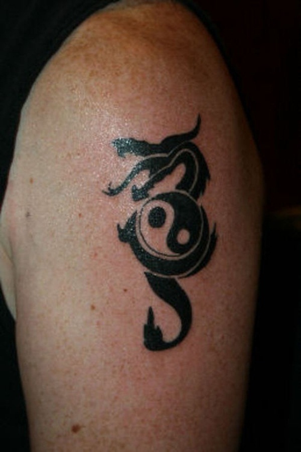 Black Yin Yang In Dragon Tattoo On Man Shoulder