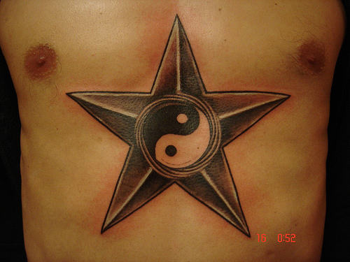 Black Yin Yang In Nautical Star Tattoo On Man Chest