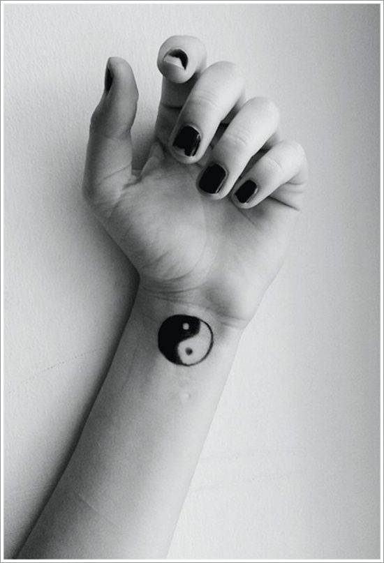 Black Yin Yang Tattoo On Wrist