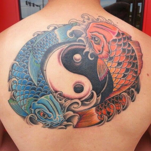 Black Yin Yang With Colorful Pisces Tattoo On Upper Back