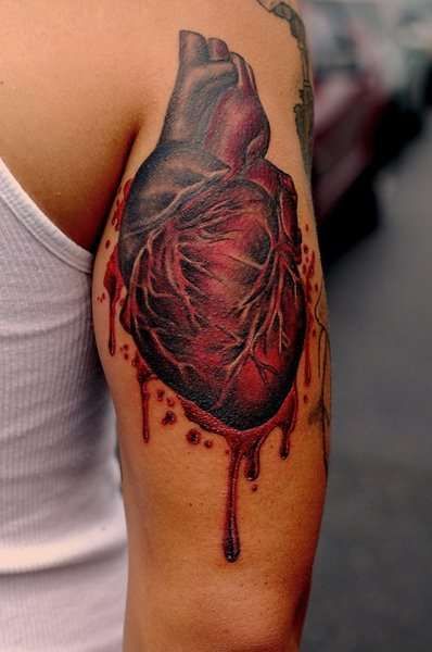 Blooded Anatomical Human Heart Tattoo on Arm