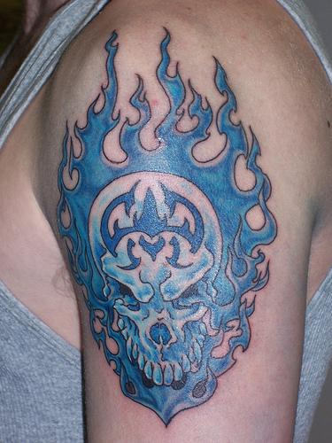 Blue Skull In Fire Flame Tattoo On Shoulder