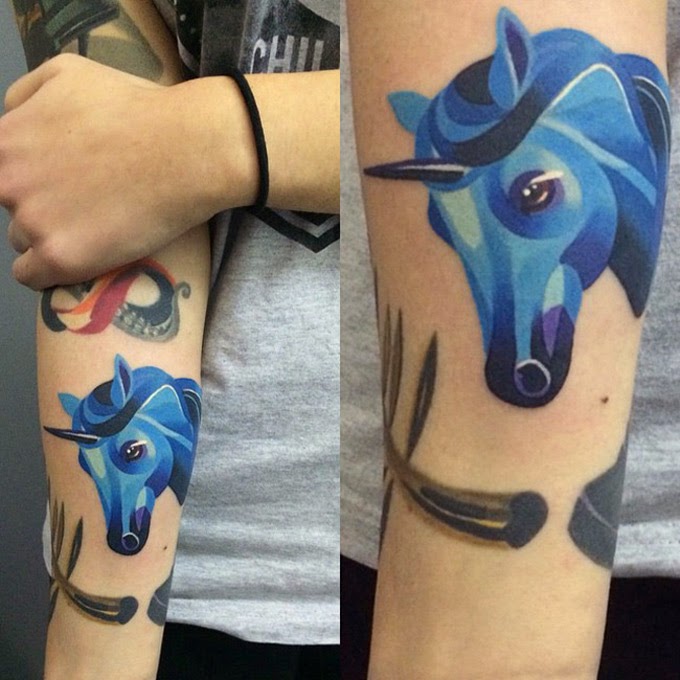 Blue Unicorn Head Tattoo On Forearm