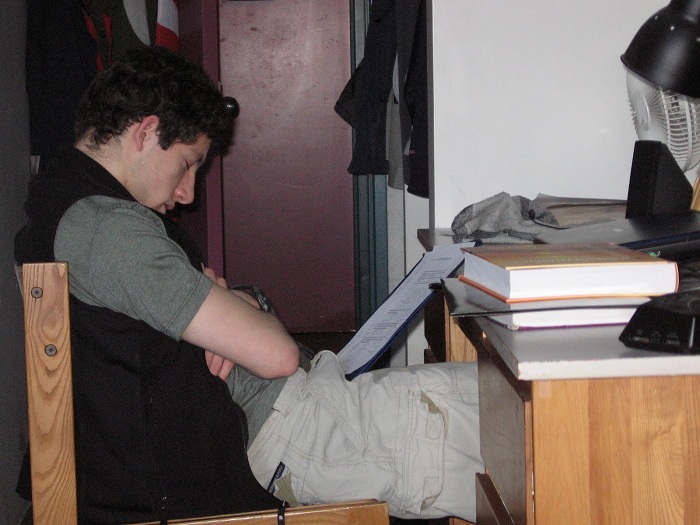 Boy Funny Sleeping On Study Table