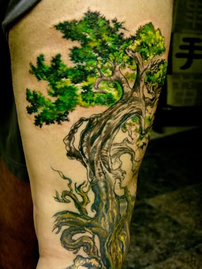 Brown Tree With Green Leaves Tattoo On Forearm