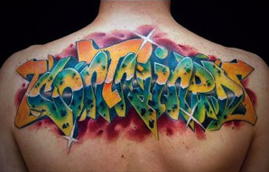 Colored Ink Graffiti Tattoo On Upper Back