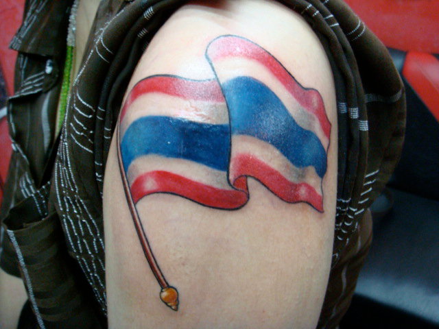 Colorful 3D Flag Tattoo On Man Shoulder