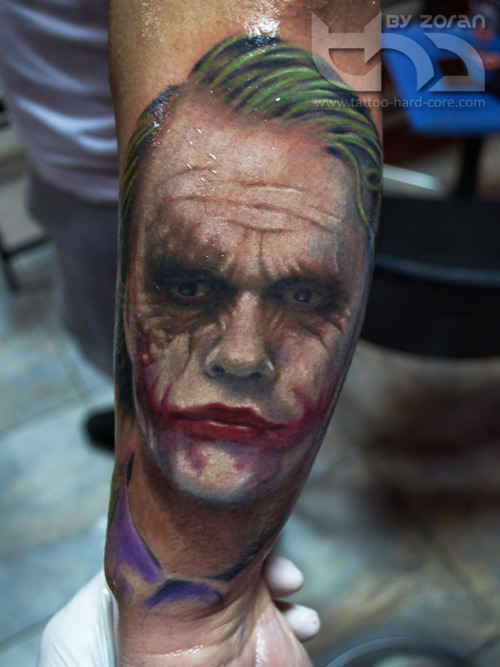 Colorful 3D Joker Face Tattoo On Forearm By Zoran Gavric