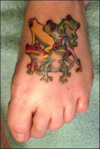 Colorful Five Frogs Tattoo On Foot