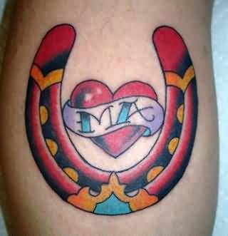 Colorful Heart With Banner In Horseshoe Tattoo Design