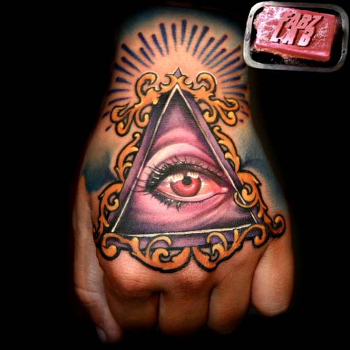 Colorful Illuminati Eye Tattoo On Hand