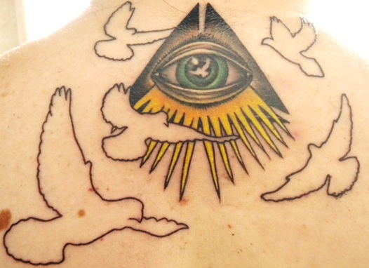 Colorful Illuminati Eye With Flying Doves Outline Tattoo On Upper Back