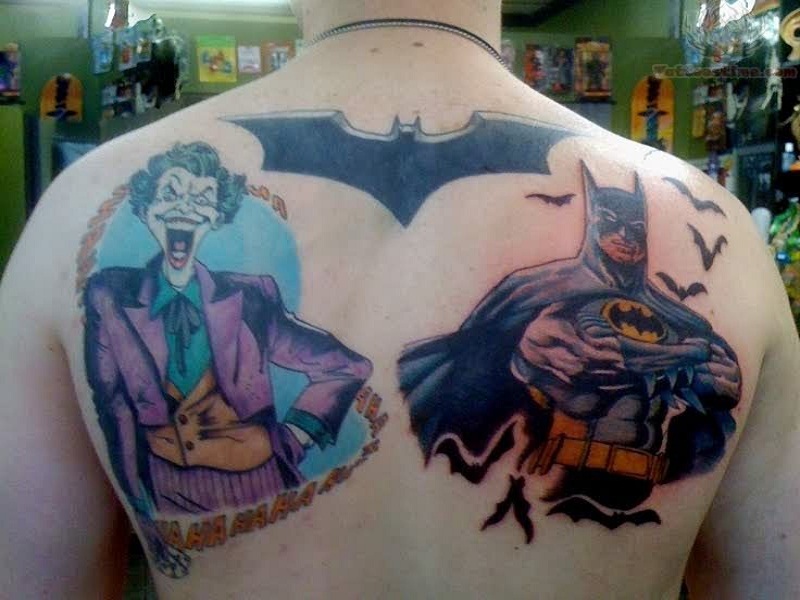 Colorful Joker And Batman Tattoo On Man Upper Back
