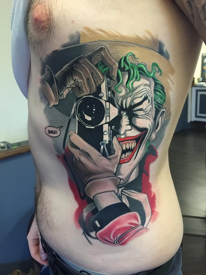 Colorful Joker With Camera Tattoo On Side Rib By Polish Dan
