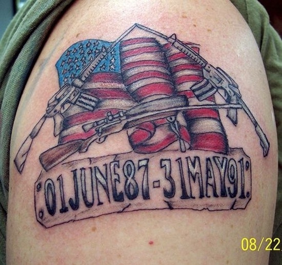 Colorful Memorial  United States Flag With Guns Tattoo On Man Shoulder
