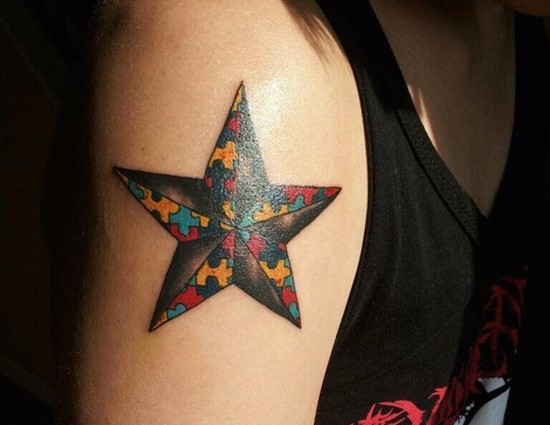 Colorful Puzzle In Nautical Star Tattoo Design