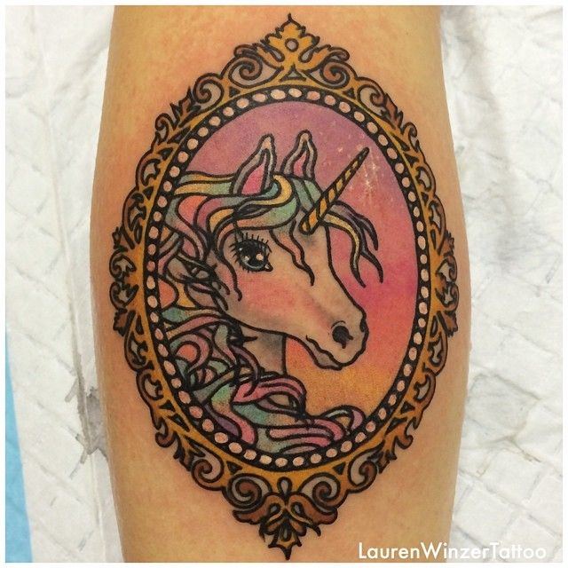Colorful Unicorn Head In Frame Tattoo Design