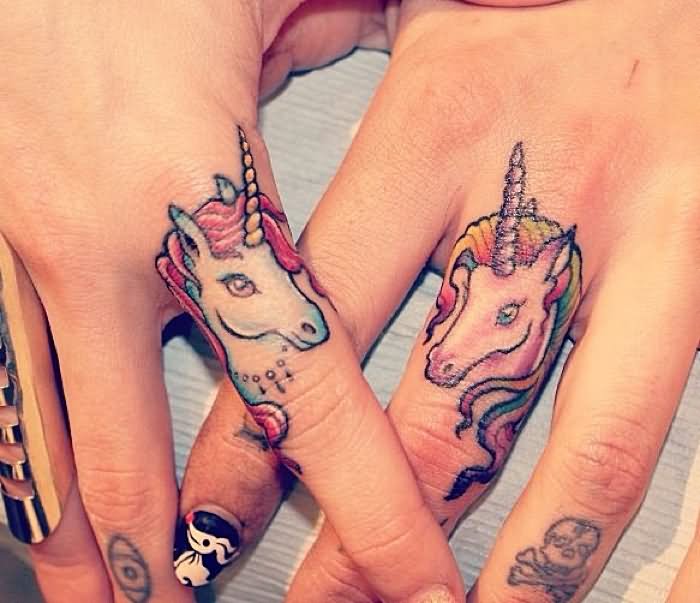 Colorful Unicorn Head Tattoo On Couple Finger