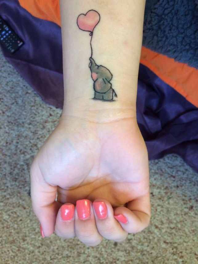 Cute Elephant Calf With Heart Balloon Tattoo On Wrist
