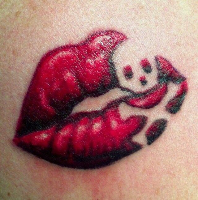 Danger Skull In Lips Tattoo Design