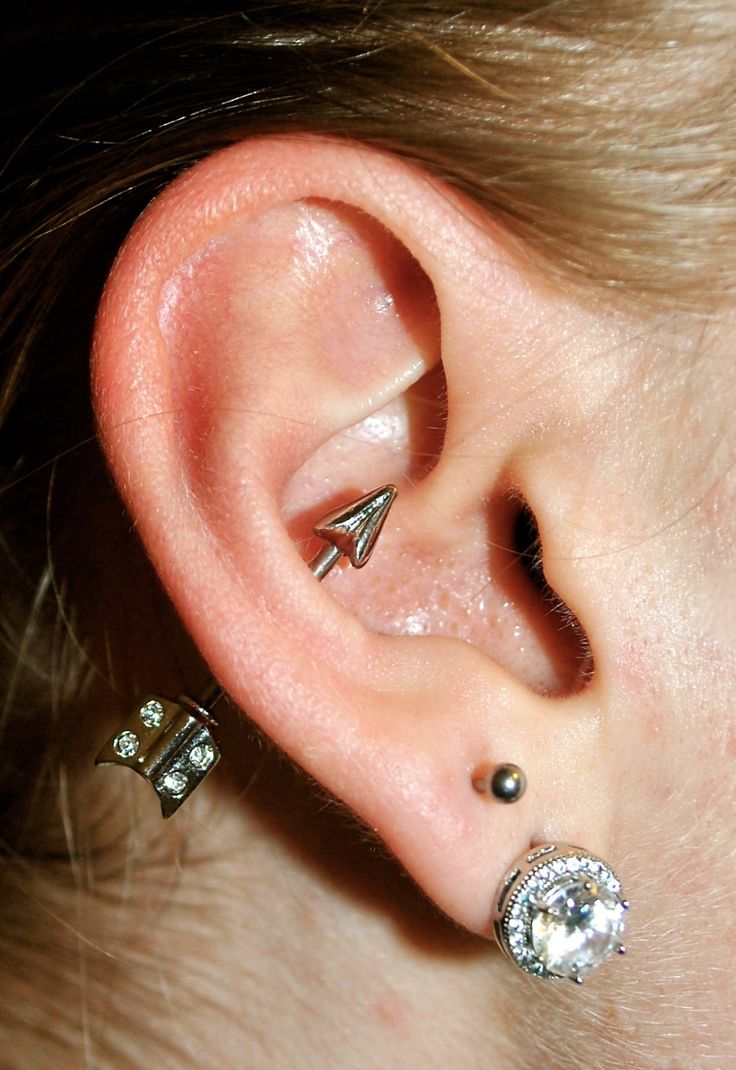 Double Lobe And Outer Conch Piercing With Arrow Stud