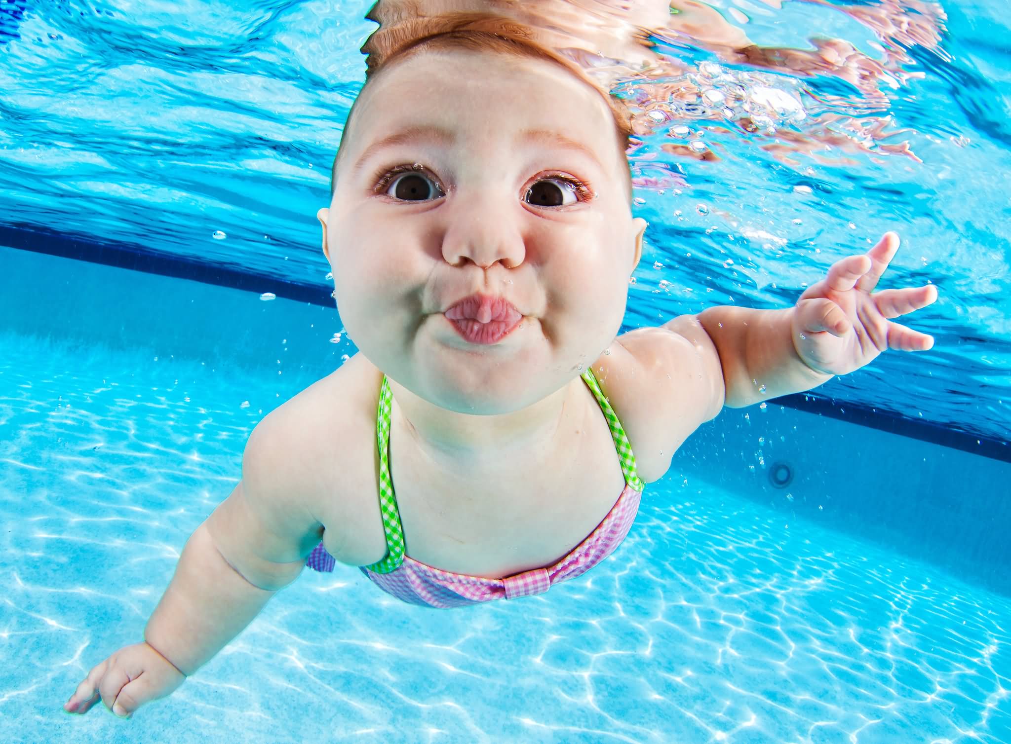 Funny Swimming Baby Pouting Face