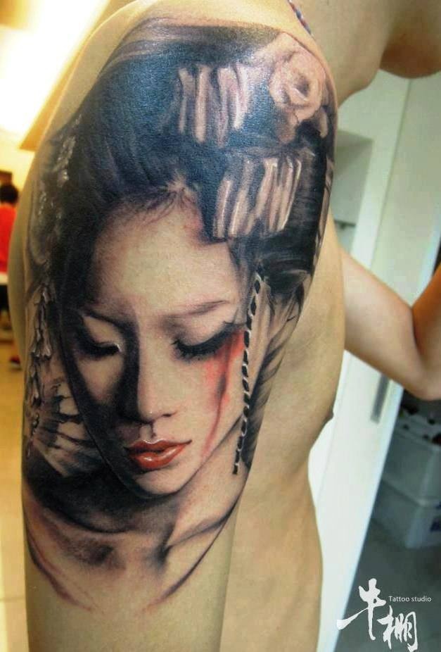 Grey Geisha Face Tattoo On Man Shoulder