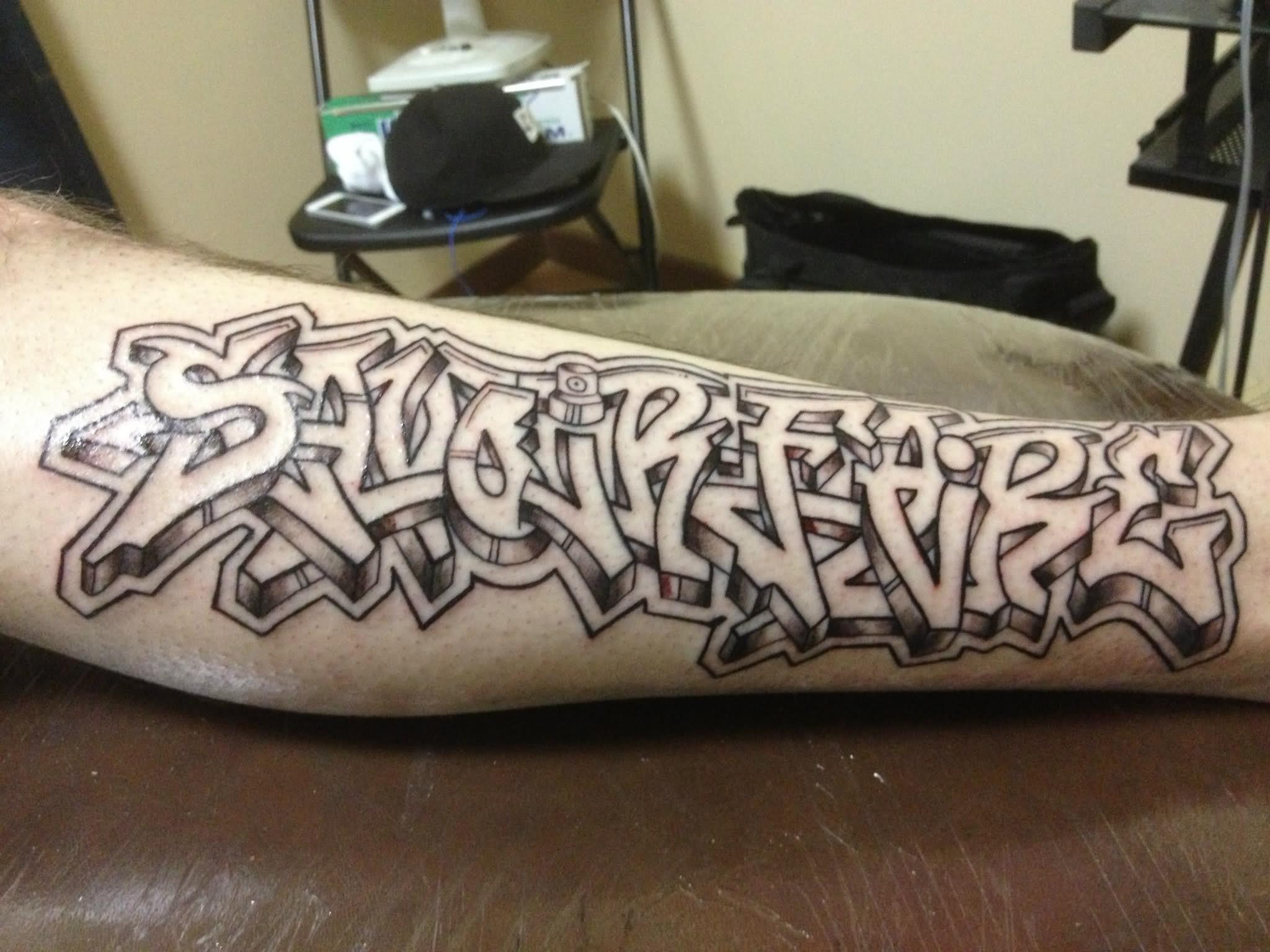 Grey Ink Graffiti Tattoo On Leg
