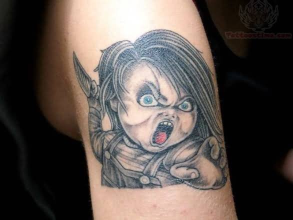 Grey Knife On Chucky Hand Tattoo On Shoulder