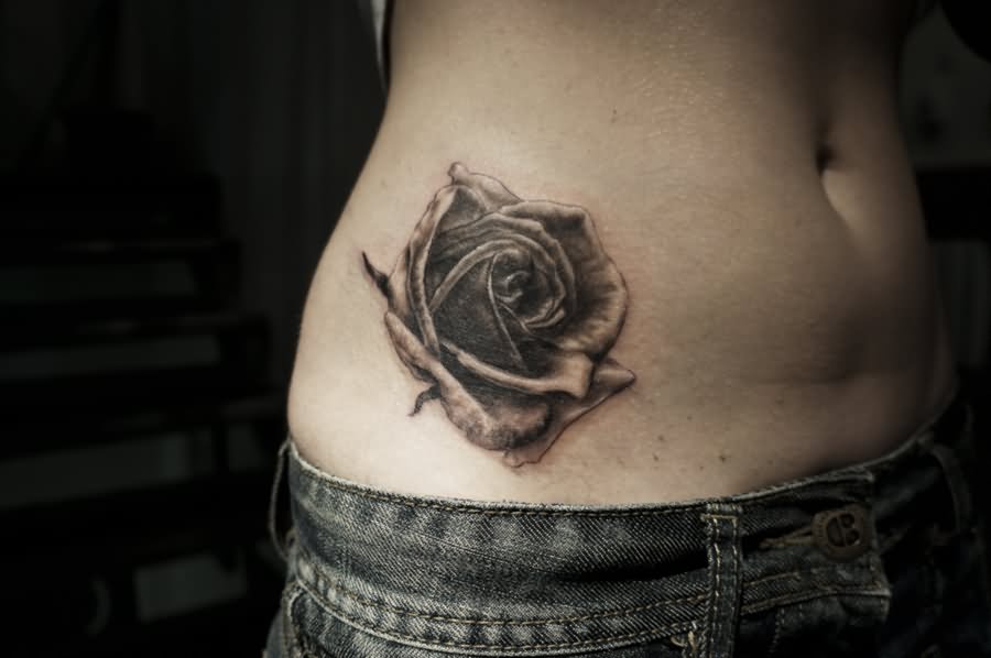 Grey Realistic Rose Tattoo On Side Rib By Anthony Noble