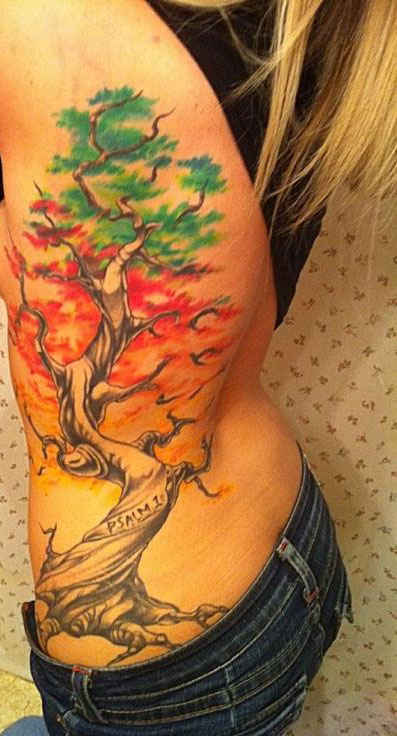 Grey Tree With Colorful Leaves Tattoo On Girl Side Rib