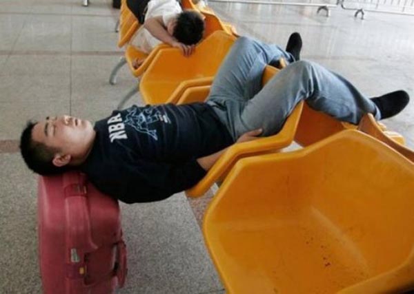 Guy Funny Sleeping With Support Suitcase