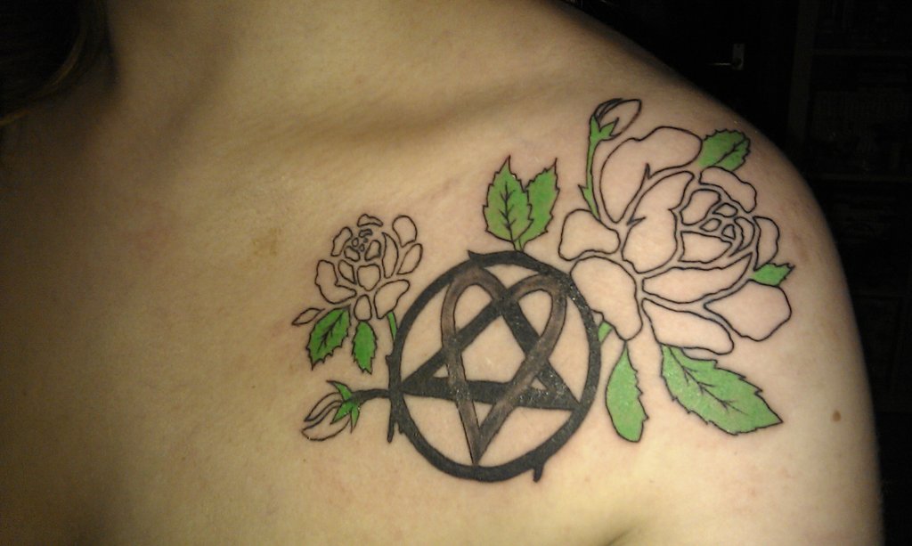 Heartagram Tattoo On Left Collarbone by Ras Blackfire