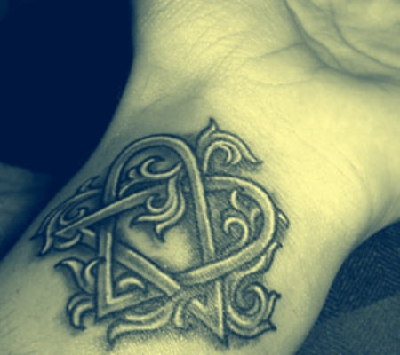 Heartagram Tattoo On Left Wrist