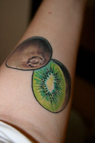 Kiwi Fruit Tattoo On Forearm