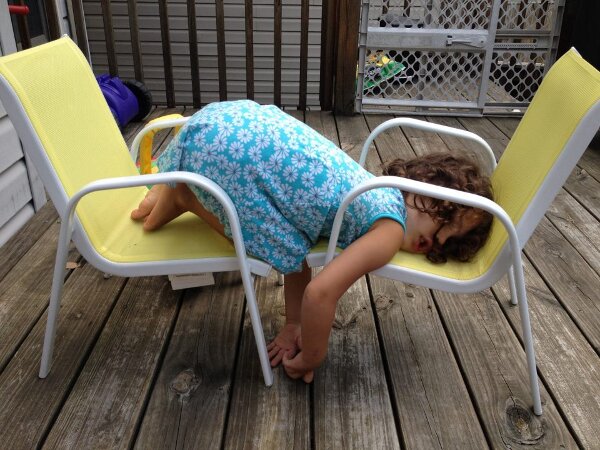 Little Girl Funny Sleeping On Chair
