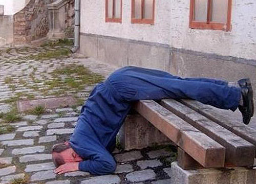 Man Sleeping In Funny Pose