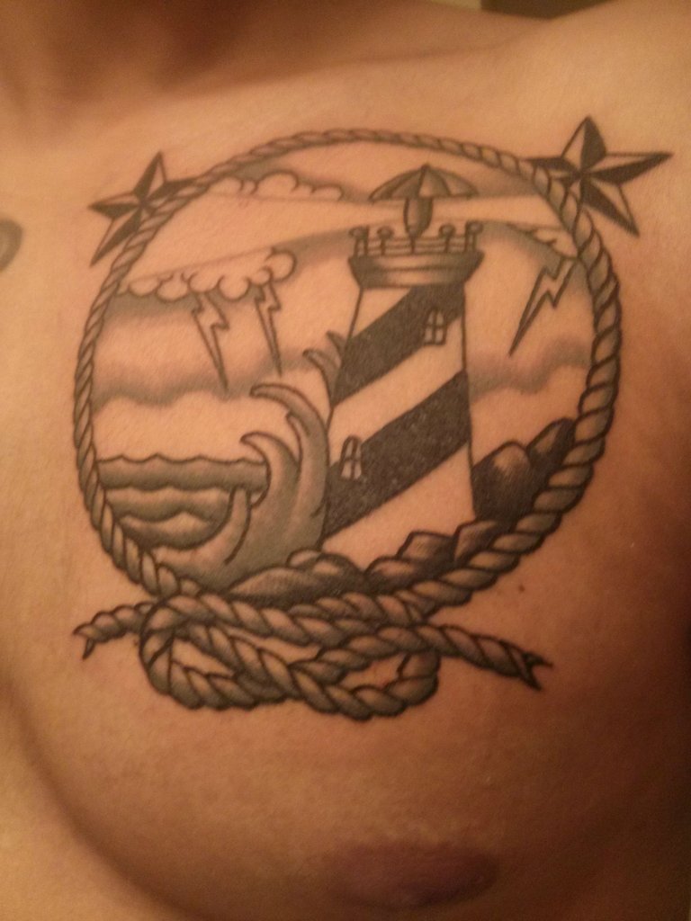 Nautical Lighthouse Tattoo On Chest For Men