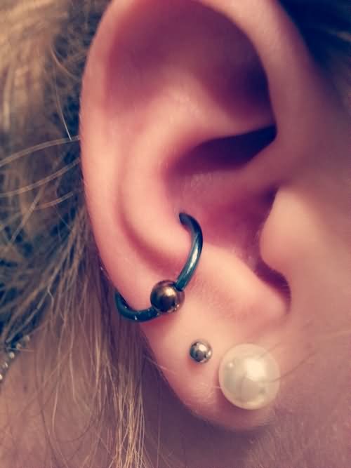 Nice Dual Lobe And Bead Ring Conch Piercing On Right Ear