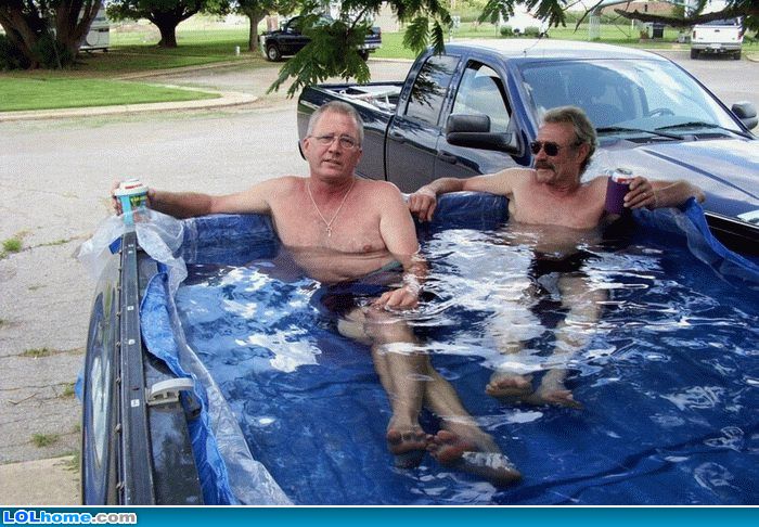Old Man Relaxing In Car Swimming Pool