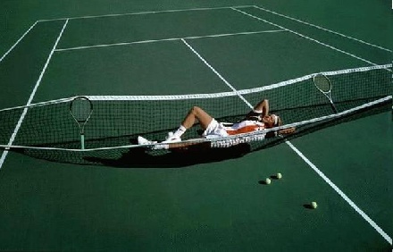 Player On Funny Tennis Net
