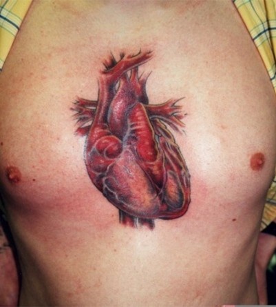 Real Heart Tattoo on Man's Chest