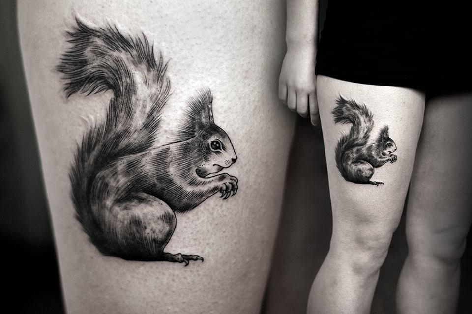 Realistic Black And Grey Squirrel Tattoo On Girl Thigh