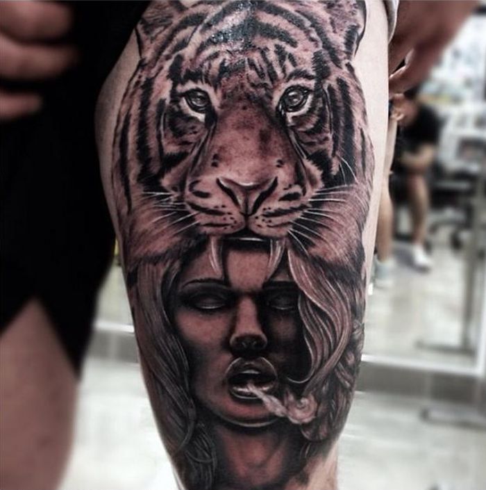 Realistic Tiger Head With Girl Face Tattoo On Thigh