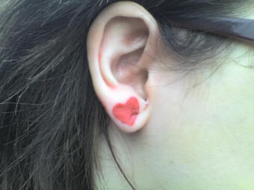 Red Heart Tattoo On Girl Ear