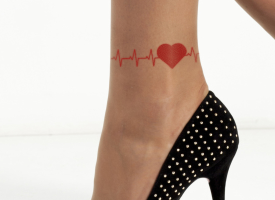 Red Heart With Heartbeat Tattoo On Girl Ankle