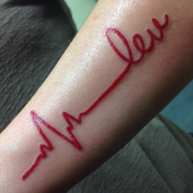 Red Heartbeat Tattoo On Forearm