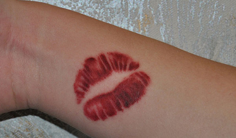 Red Lip Print Tattoo On Wrist