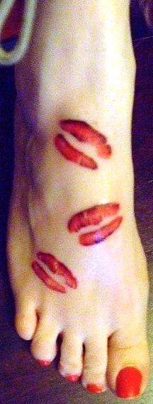 Red Three Lips Prints Tattoo On Girl Foot
